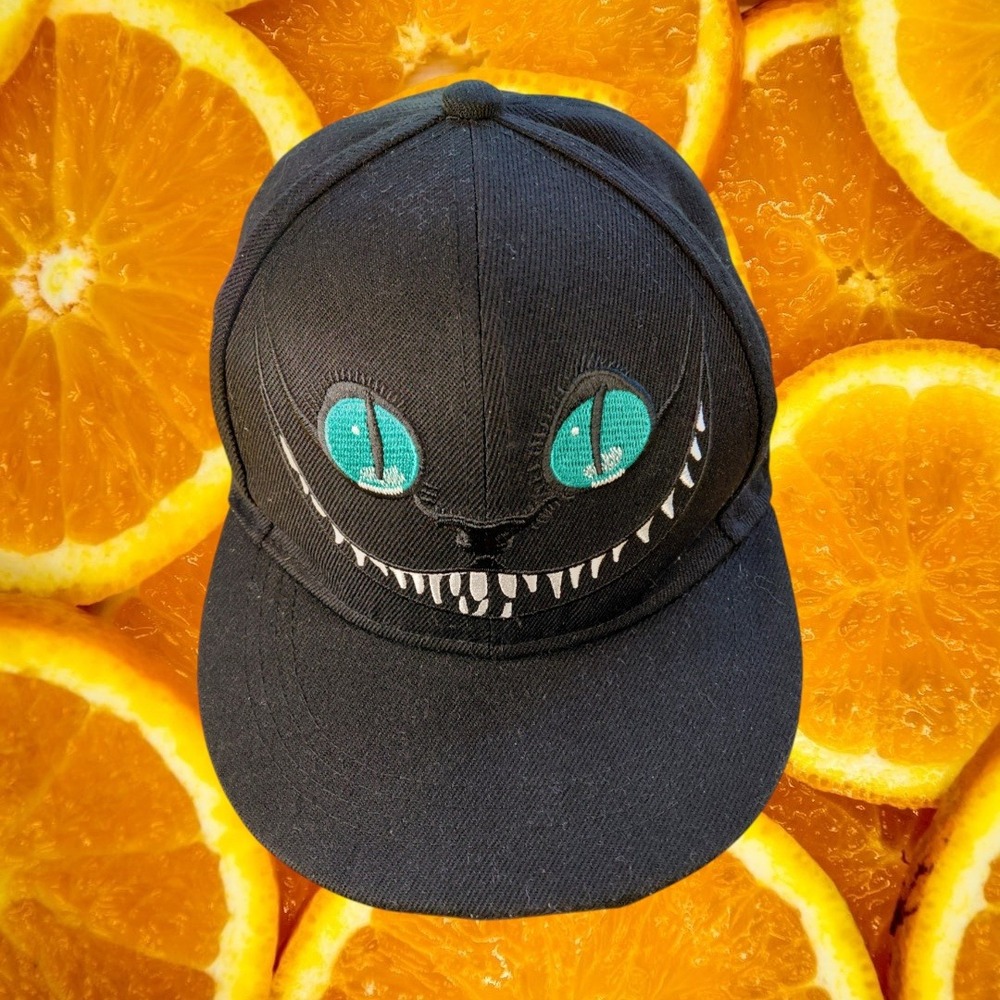 Alice in Wonderland Cheshire Cat Snapback Hat Black Most Everyone's Mad Here Cap